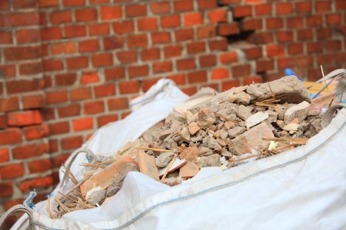 Construction site in Yeading with organized waste containers