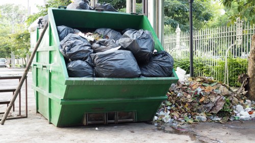 Workers sorting recyclable materials at a transfer station